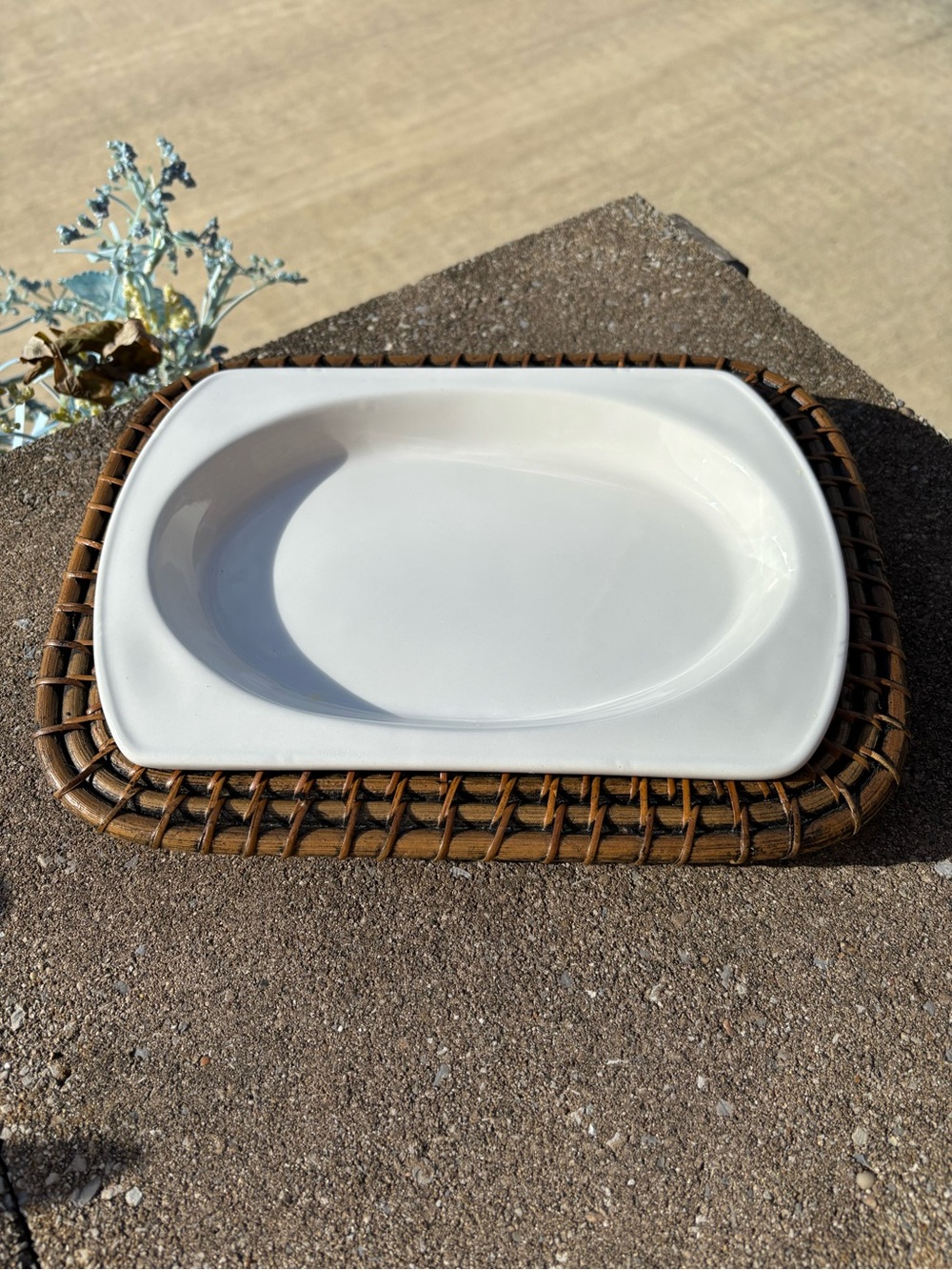 Title: White Ceramic Serving Platter with Woven Rattan Charger Tray